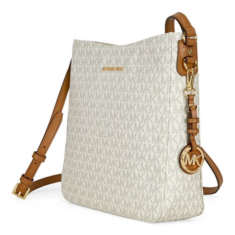 michael kors jet set travel large logo messenger vanilla|Michael Kors Messenger bag.